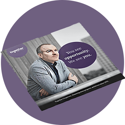 A brochure of a businessman in front of a lilac background.