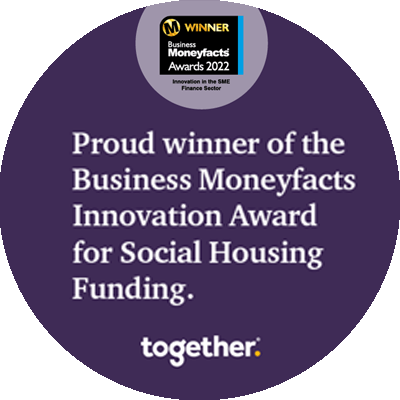 A purple circle with proud winner of the business moneyfacts innovation award for social housing funding written in it.