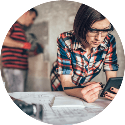 Young couple completing medium renovations on a property.