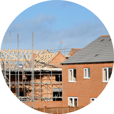 Partly constructed new build homes with scaffolding