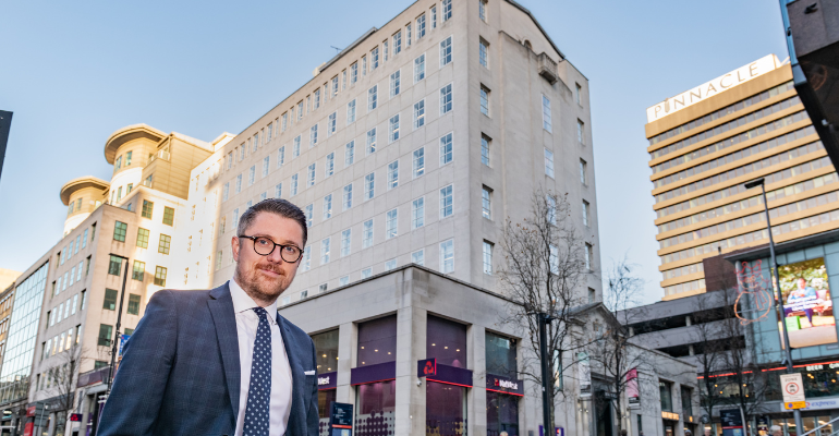 Michael Devanny, Corporate Development Director for Yorkshire at Together, stood outside 8 Park Row office building after helping investors secure the property with a multi-million-pound commercial mortgage.