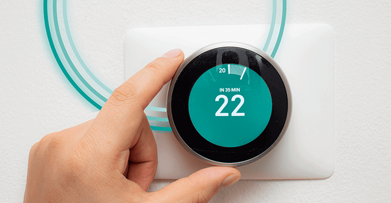 Someone touching a digital time.