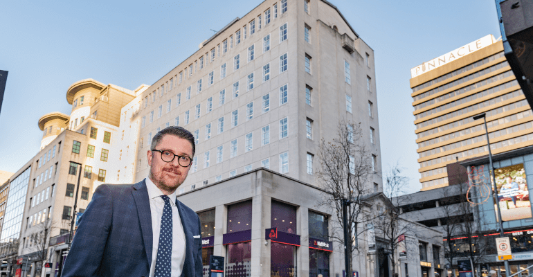 Michael Devanny, Corporate Development Director for Yorkshire at Together, stood outside 8 Park Row office building after helping investors secure the property with a multi-million-pound commercial mortgage.