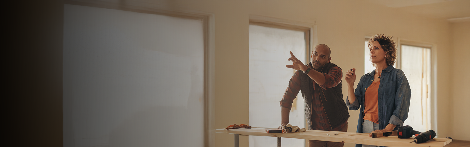 A contractor and a landlord discussing renovation plans.