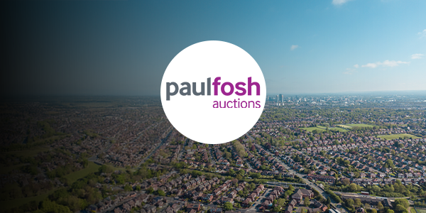 A birds eye view of Manchester with a Paul Fosh logo over it.
