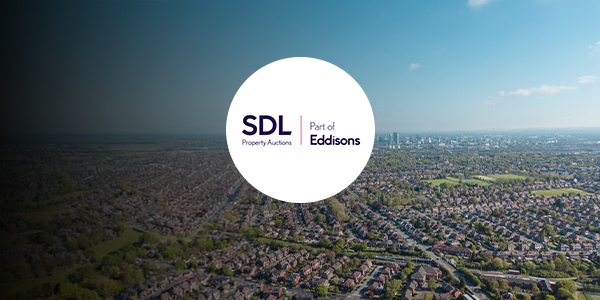 A birds eye view of Manchester with an SDL logo over it.