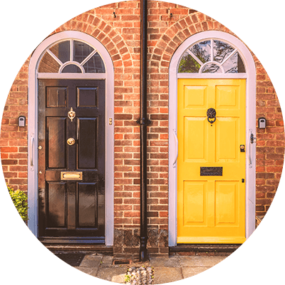 A close up of two doors next to each other.